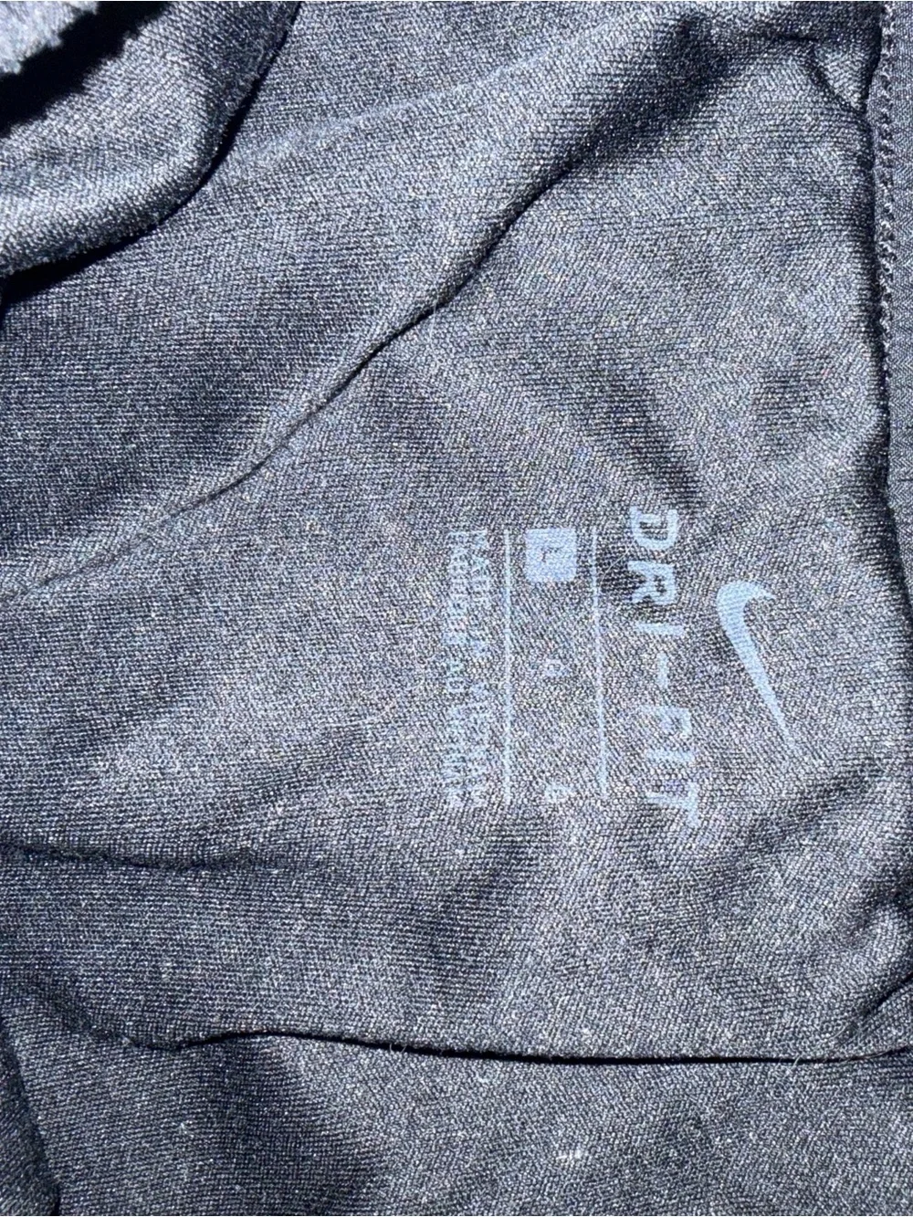 Nike Kids Black Puffer Jacket with White Trim